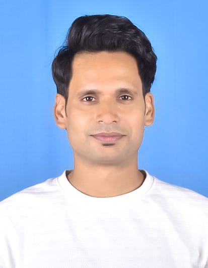 Krishna Pratap Mishra in a white T-shirt